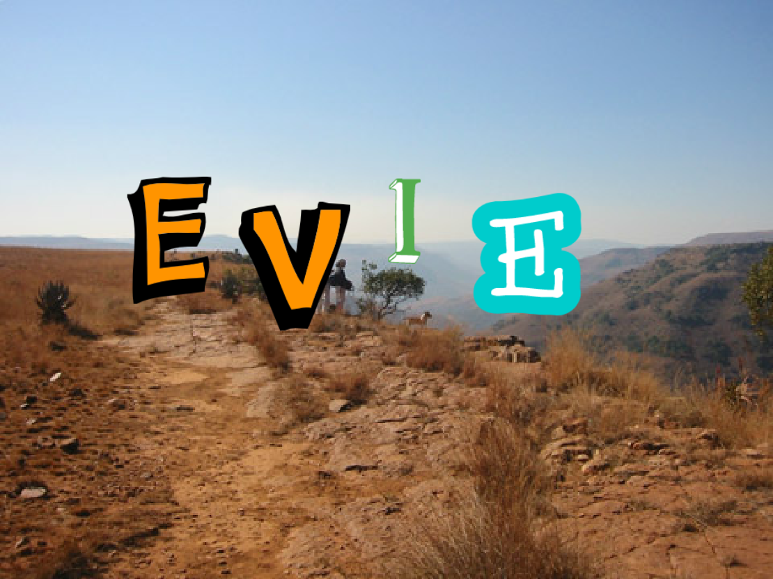 Western background with mountains and the letters E V I E in cartoonish text